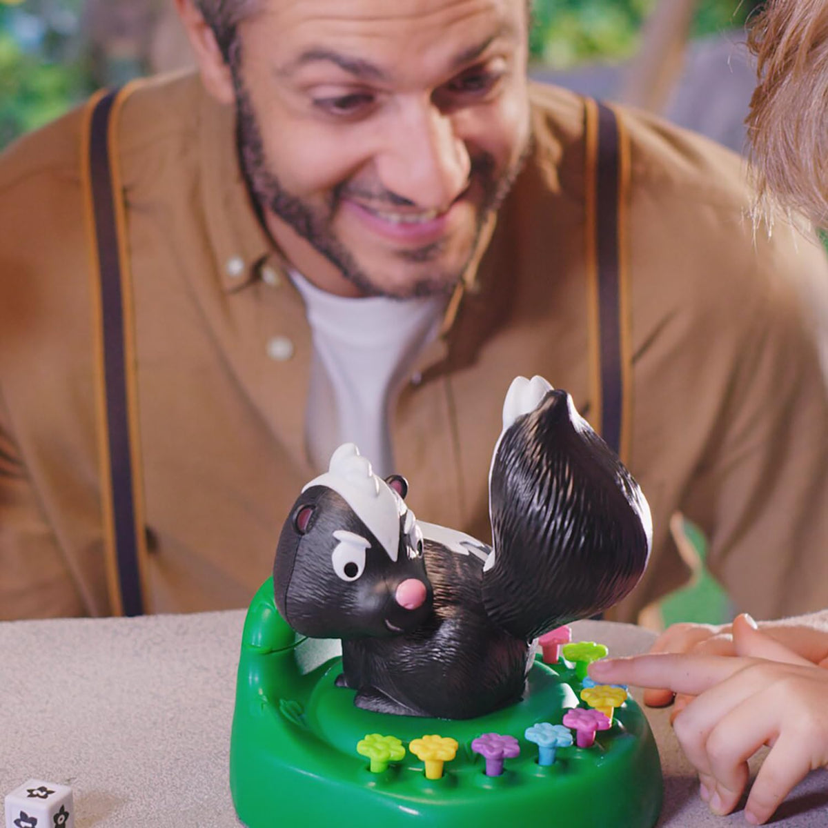 Ambassador Games: SKUNKED! - Kids Dice-Rolling & Luck Game, Funny Surprise Water Spray, Adorable Skunk & Flower Theme, Ages 4